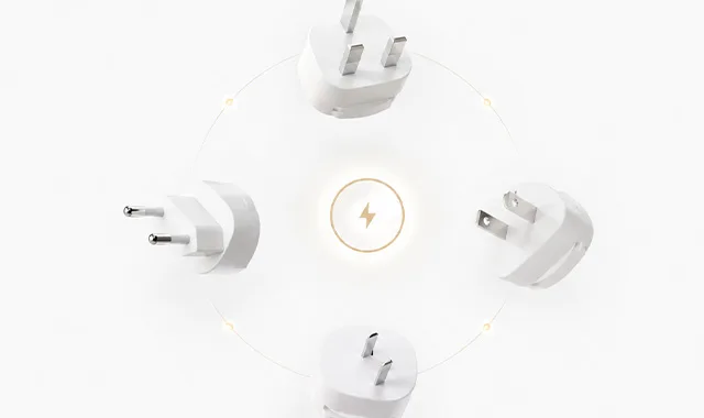 Adaptadores de ficha internacionais dispostos em torno de um símbolo de energia