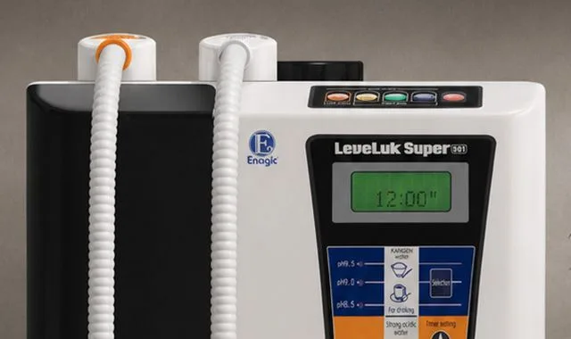 Sistema de mangueira dupla do Super 501 e painel de controlo com o temporizador de produção em funcionamento